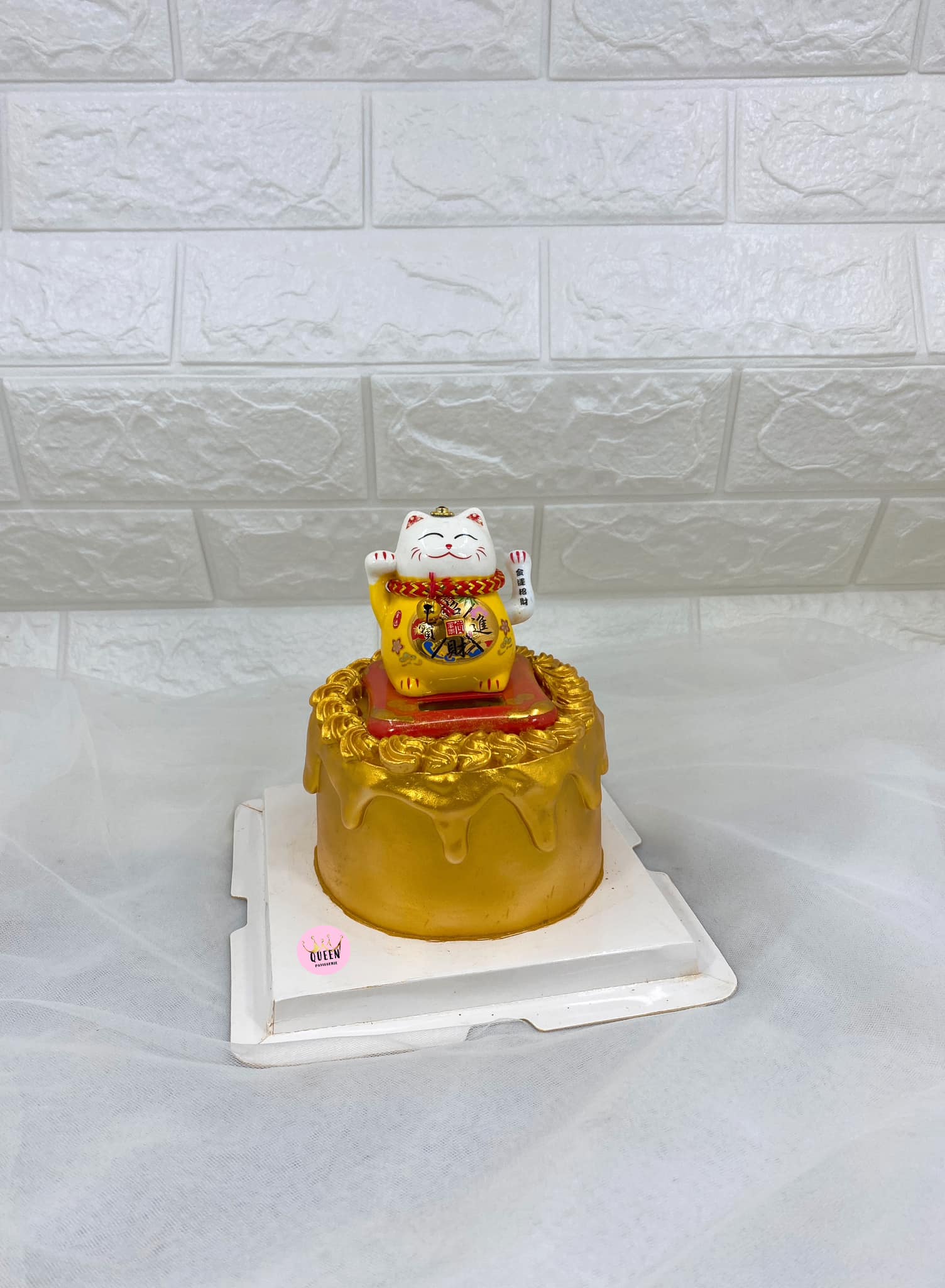 Bring a little extra luck to your celebration with the adorable Fortune Cat